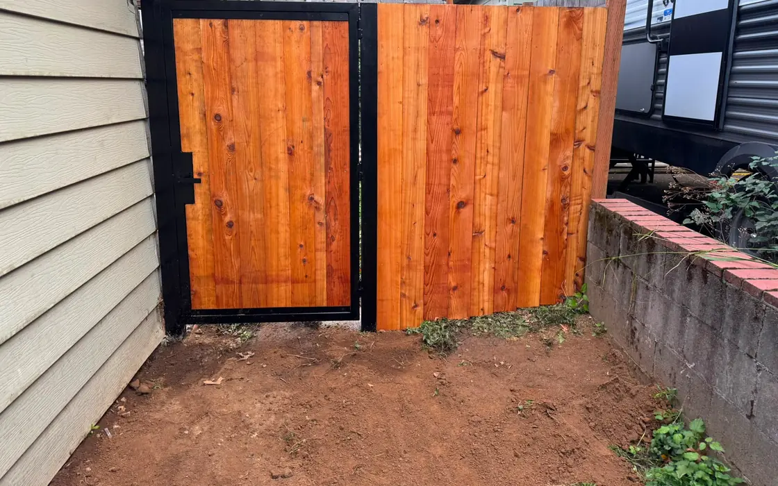 Cedar swing gate and matching fence panel in narrow side yard by RV. Fence & gate installation in Scappoose